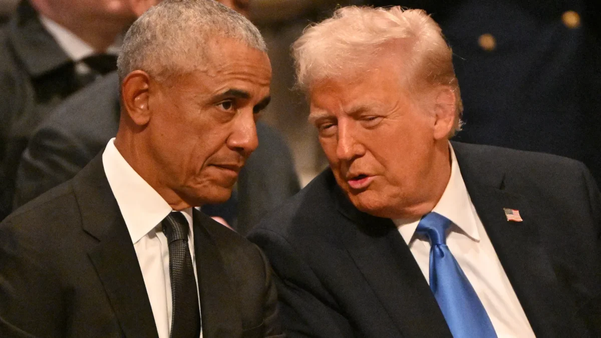 President Trump sitting with Barack Obama during the funeral for former President Jimmy Carter