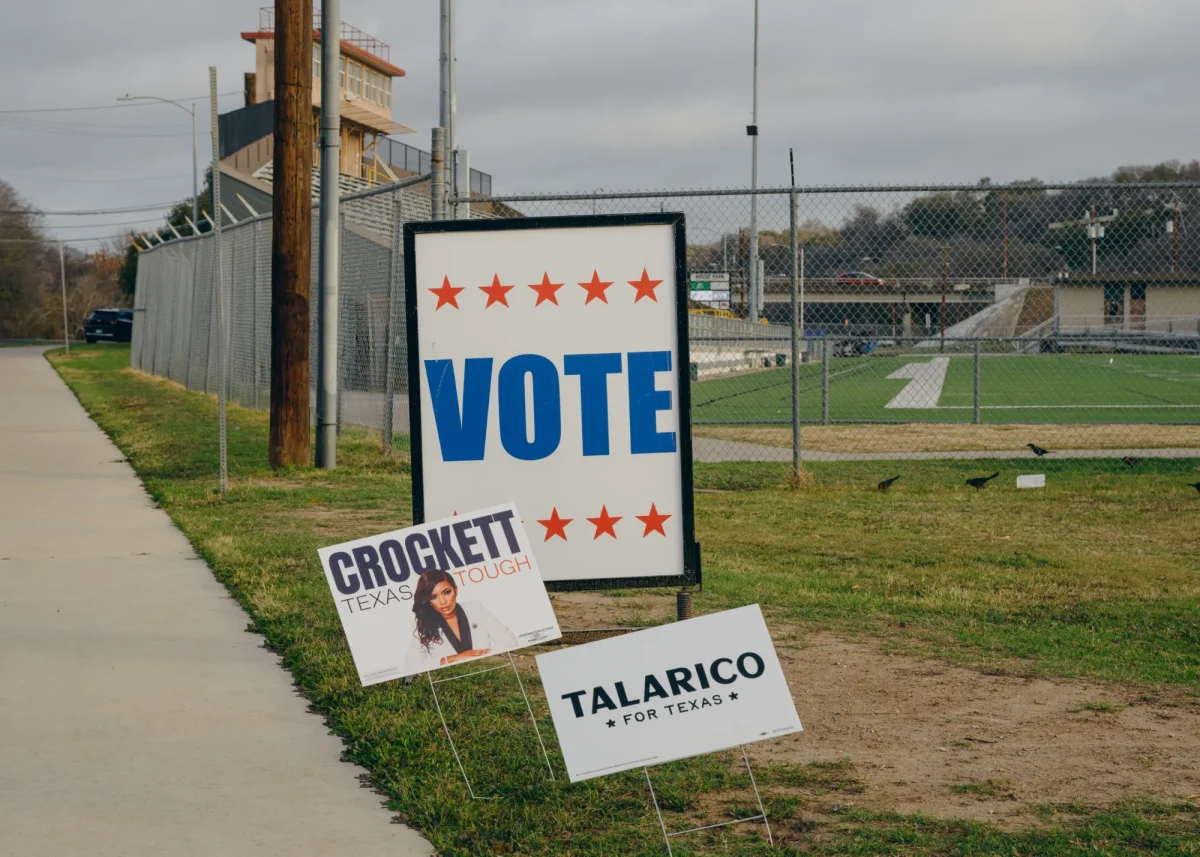 Campaign signage outside the Austin Recreation Center polling site during early voting on Wednesday, Feb.25, 2026.